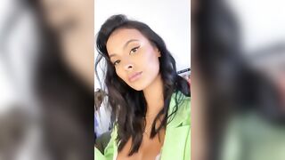 Maya Jama: Green jacket cleavage (taken from IG Stories) #2