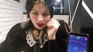 Black Hair and Pale Skin: Bluetooth remote vibrator in a restaurant #3