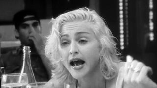 Madonna deep throats a bottle (1991)