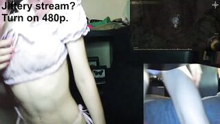 Petite gamer girl Eve black stripping during her gaming session