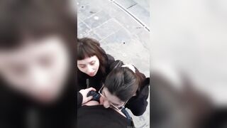 Risky double blowjob in the middle of the street