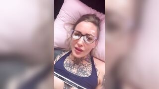 Licking cum off her glasses