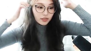 Hyoon in a tight sweater