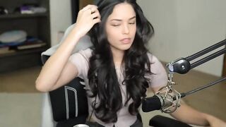 Rae playing with her hair and looking stunning